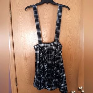 Women's size large,  black and white plaid skirt